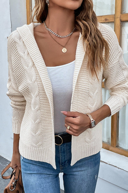 Cable-knit dropped shoulder hooded cardigan with open front, cable pattern, and long sleeves.