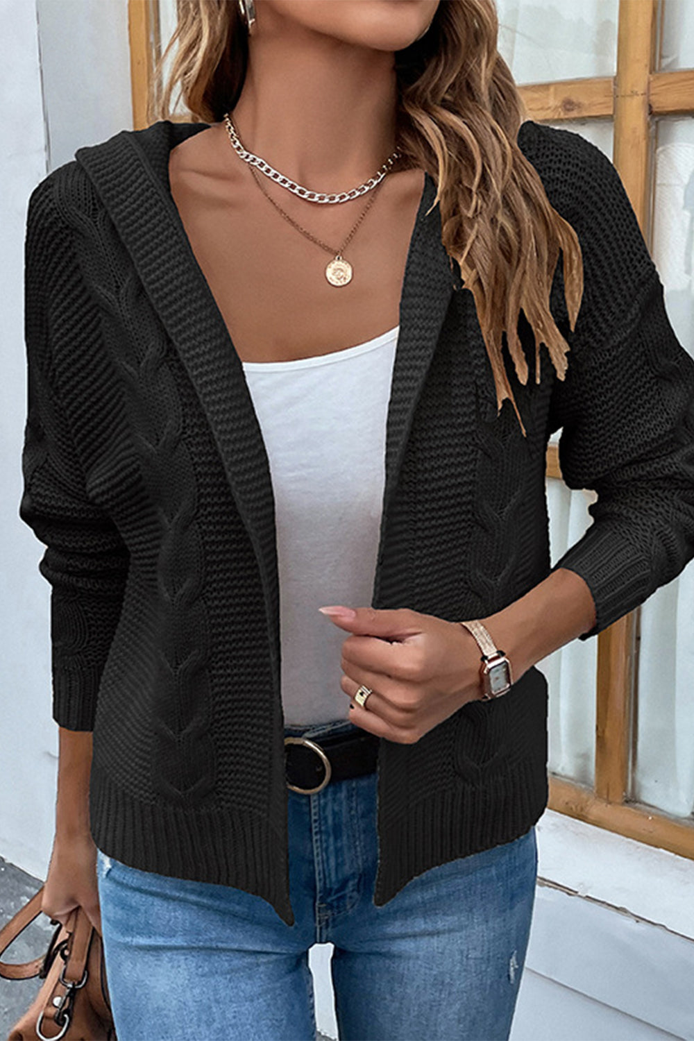 Cable-Knit Dropped Shoulder Hooded Cardigan with open front, black cable-knit pattern, and relaxed fit.