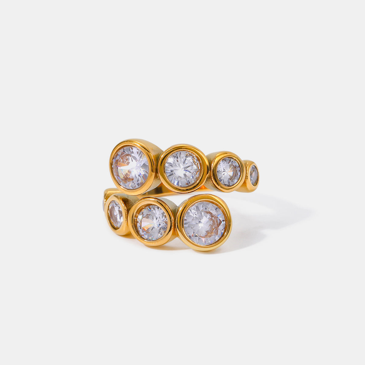 Stainless Steel Inlaid Zircon Bypass Ring with 18K gold plating and dazzling zircon stones in modern bypass style.