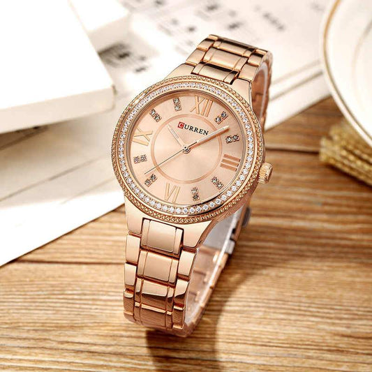 CASSANDRA Womens Classic Watch in rose gold, elegant design with quartz movement and crystal accents.