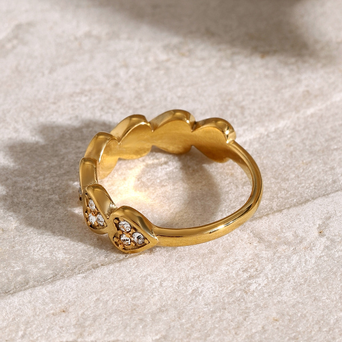 18K gold-plated stainless steel ring with zircon heart inlay.