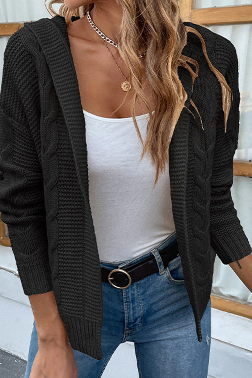 Cable-Knit Dropped Shoulder Hooded Cardigan in black with a cable-knit pattern, open-front design, and dropped shoulder silhouette.