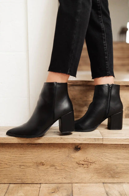 Black Amari Ankle Boots with pointed toe and block heel.