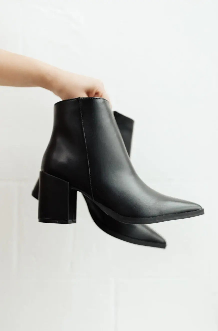 Black Amari Ankle Boots with pointed toe and block heel.