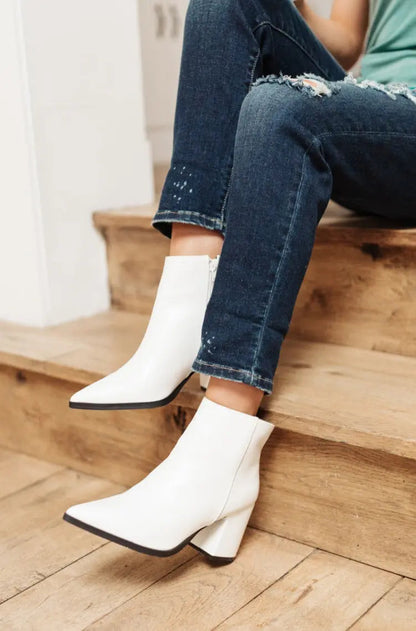 White faux leather Amari Ankle Boots with pointed toe and block heel.