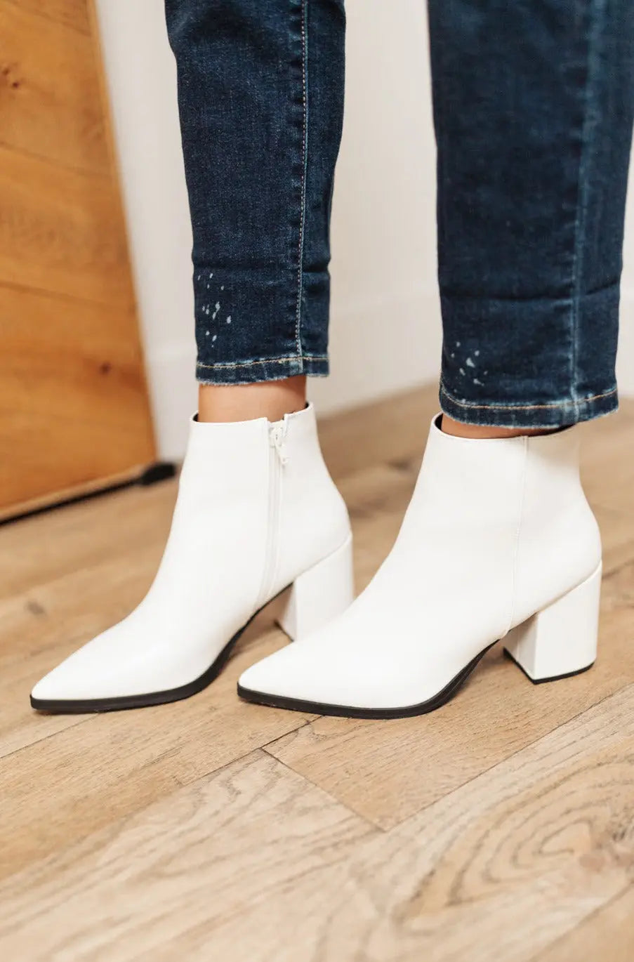 White faux leather Amari Ankle Boots with pointed toe and 2.5-inch heel.