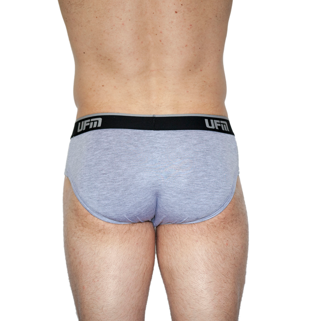 Men's bamboo briefs with adjustable pouch and REG support, back view.