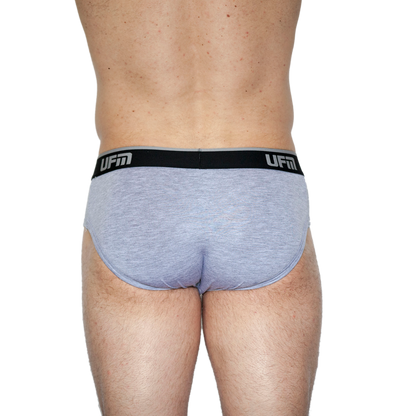 Men's bamboo briefs with adjustable pouch and REG support, back view.