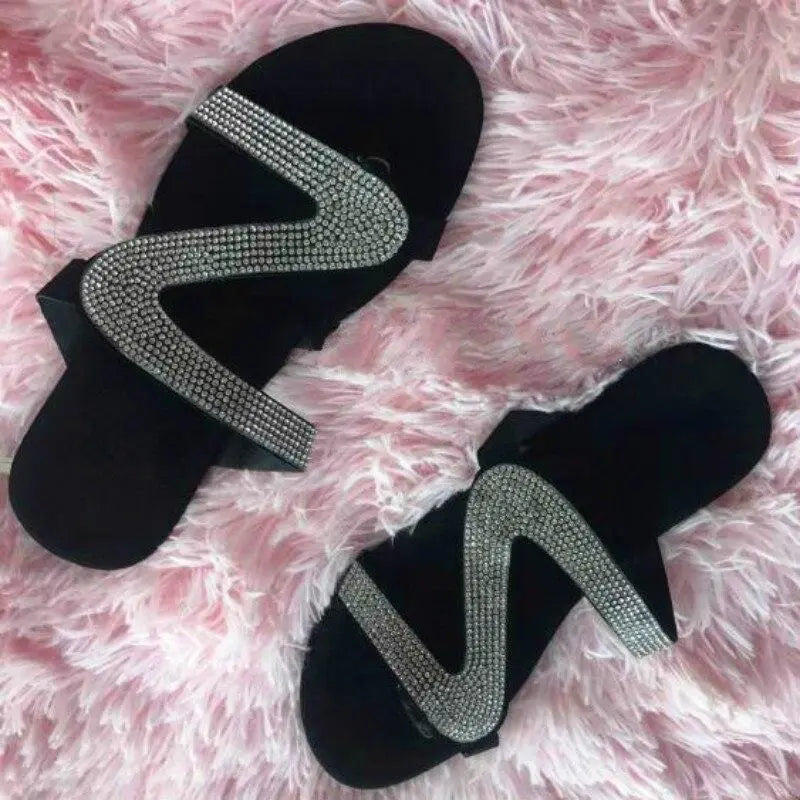 2021 Bling Bling Slides Women's Slippers on pink furry background.