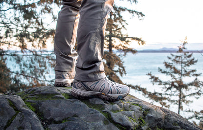 ROCKROOSTER Bedrock Sand 6 Inch Waterproof Hiking Boots with VIBRAM® outsole on rocky outdoor terrain.