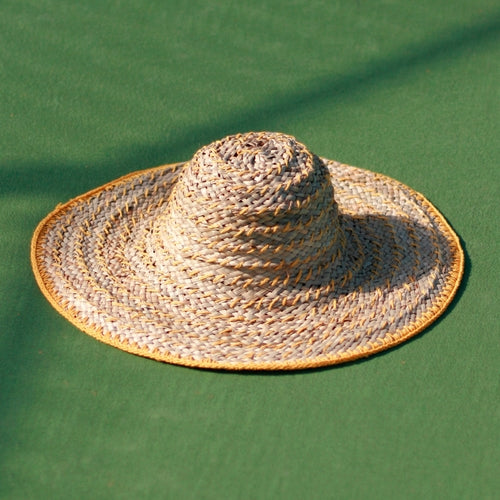 Balinese Pecatu Wide Round Straw Hat In Butter Yellow Cocoa Brunn