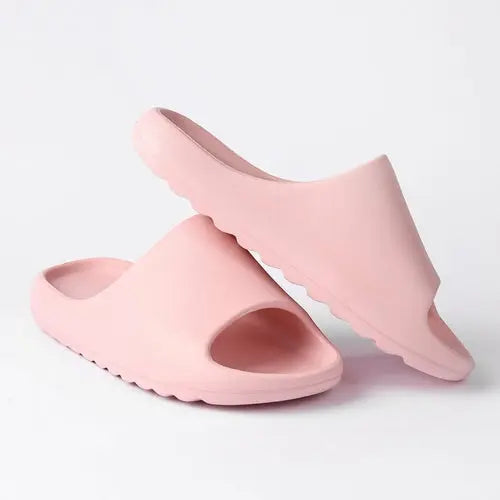 Pink cloud pillow slippers for women with platform sole; ideal for college dorms and everyday comfort.