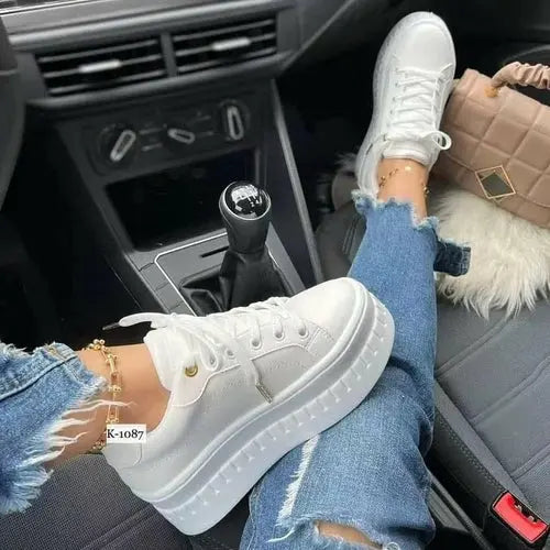 Platform women's sneakers, flat casual style.