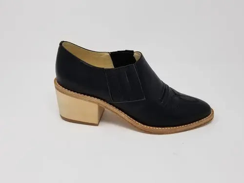 Santa Ana shoe with full leather upper and natural wood heel.