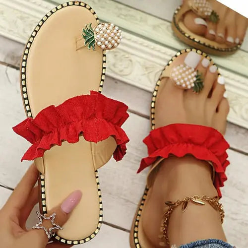 Casual flat toe women's slippers with pineapple pearl design and red ruffled straps.