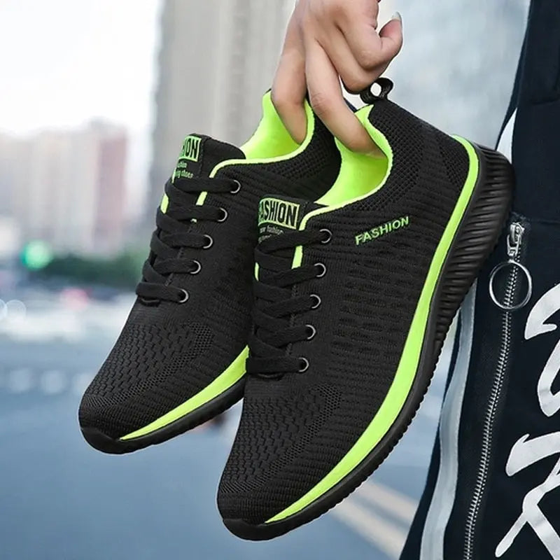 Men's lightweight running sneakers with breathable mesh, cushioned insole, and durable rubber outsole.