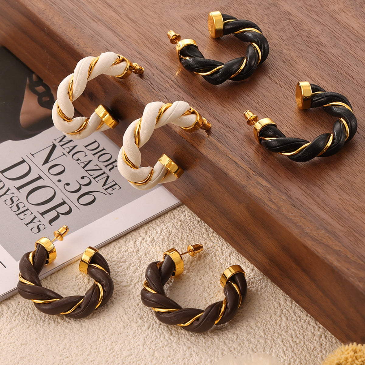 18K gold-plated twisted leather rope C-hoop earrings, elegant braided design.