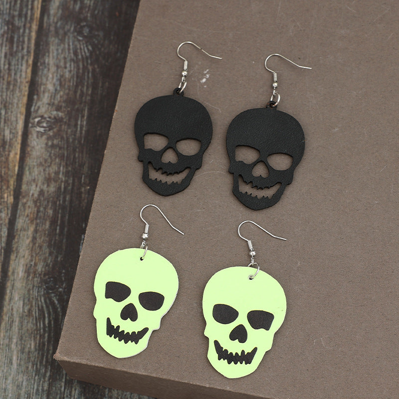 Unique 2-Pair PU Leather Skull Dangle Earrings, alloy and PU materials, edgy style, bold accessory, 2.7-inch length.