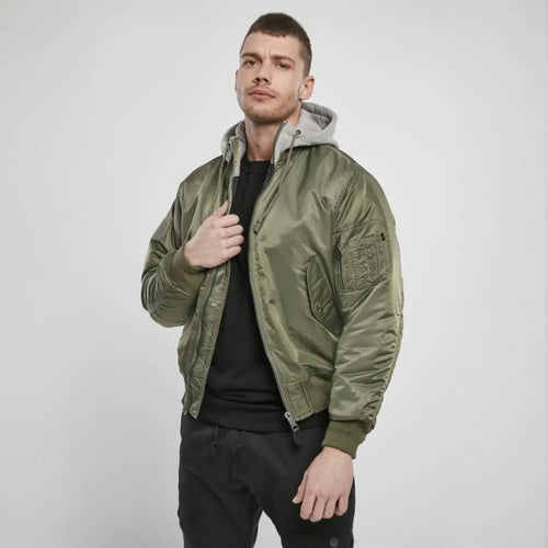 Hooded MA1 Bomber Jacket for men, green, worn by model, featuring sweat hood, knitted cuffs, and multiple pockets.